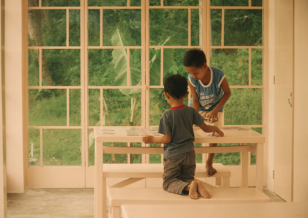 Graphic pattern resembles local timber screens. Children's Learning Center Mas-in. Design by Native Narrative 2018. Photo by Jakob Gate