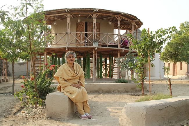Yasmeen Lari outside a women’s centre on stilts to survive floods in Sindh via nutscienceblog.files.wordpress.com