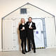 The winners in front of part of their design. Image: Getty Images