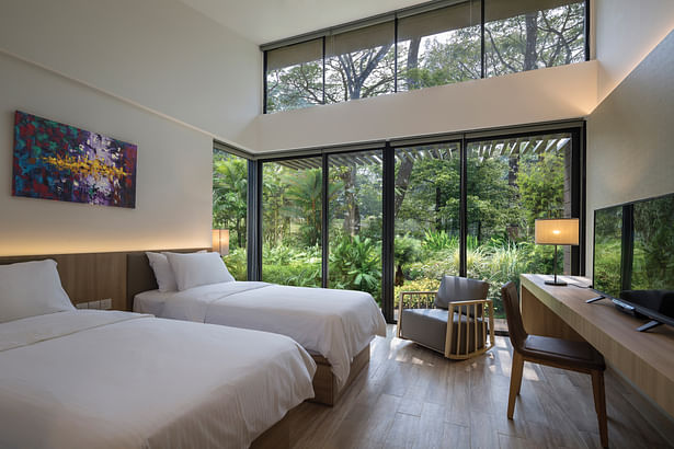 Full-height glazing brings stunning views of the nature reserve inside the guesthouse.