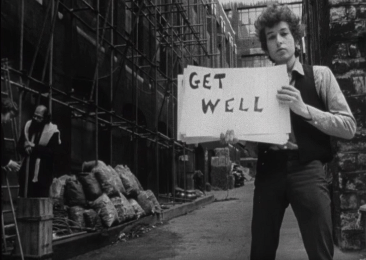 Decide whether you want to go with slides, or printed boards. Screenshot of Bob Dylan's 'Subterranean Homesick Blues' via youtube.com.