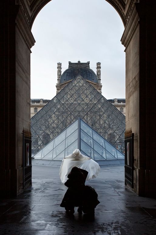A bride’s photoshoot captured from Passage Richelieu at the Grand Louvre in Paris, 2021. Photograph by Giovanna Silva. Commissioned by M+