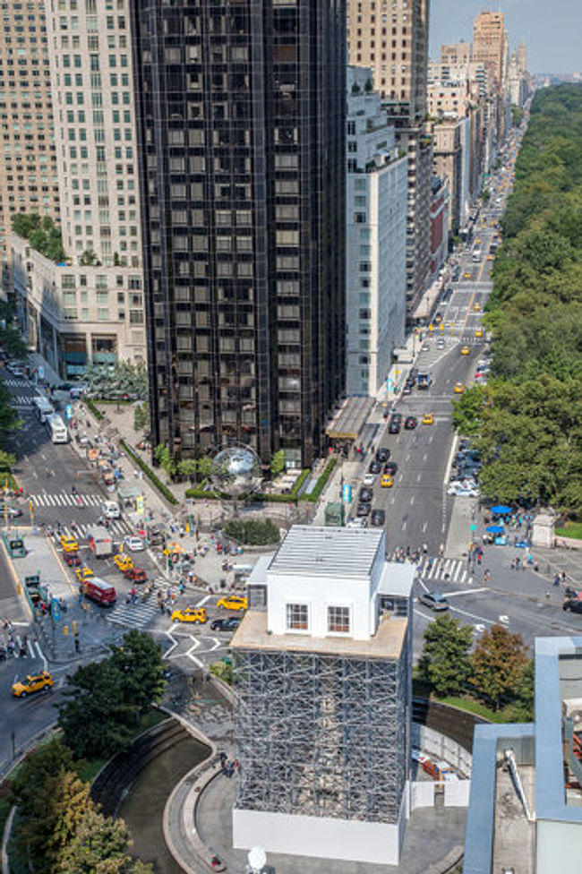 Marco Ricca for The New York Times The statue of Christopher Columbus, enclosed by a living room on a scaffold