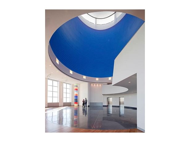 Ron Gorchov- 'Totem' art installation with Sol LeWitt - 'Wall Drawing #832 A Red Spiral on Blue' art installation above / Photo by Paul Warchol