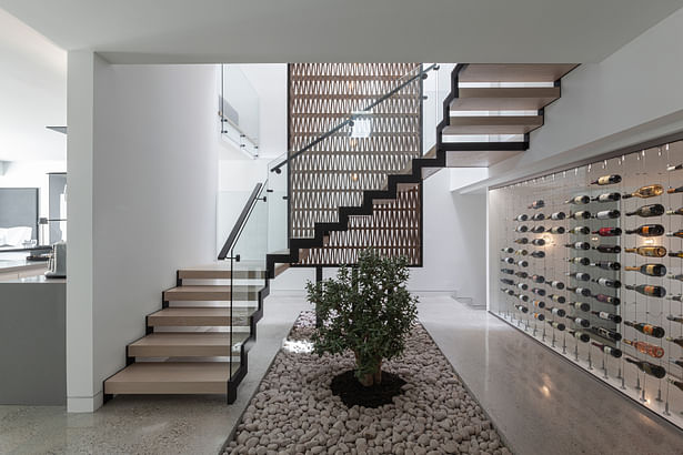 Atelier RZLBD / Stacked House / staircase, garden, wine cellar