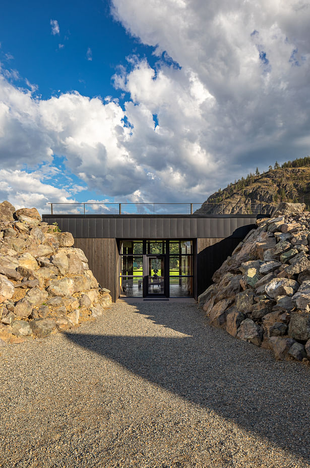 Berm House, shou sugi ban exterior of the bermed entry, Benjamin Drummond