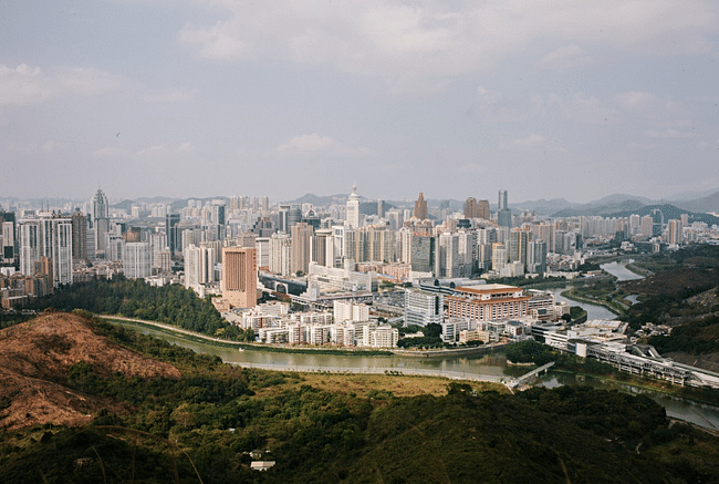 Shenzhen in 2015 from Hong Kong's Crest Hill. Image via the Guardian