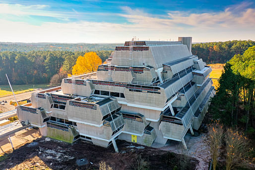Drone photo of the partially demolished Elion-Hitchings Building, completed in 1972 as the Burroughs Wellcome Building, on November 29, 2020. Photo: Wikimedia Commons user Getharding.