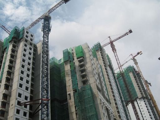 While the U.S. has been losing about 10,000 public housing units a year since 1995, Singapore is building more. (Photo by Terence Ong; via nextcity.org)