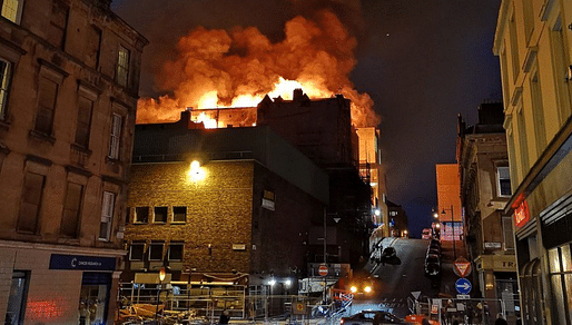 The Glasgow School of Art's Mackintosh Building on fire on June 16. Photo via STV News/<a href="https://twitter.com/STVNews/status/1007771904558686208">Twitter</a>.