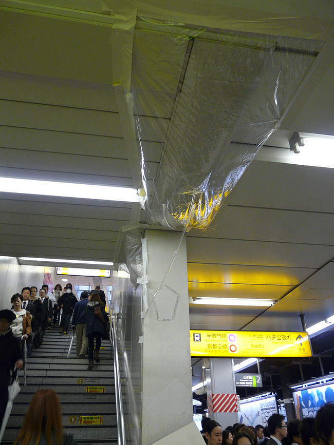 Plastic sheeting, tubes and tape used to deal with a leaky roof in Shibuya station. | Chris Berthelsen