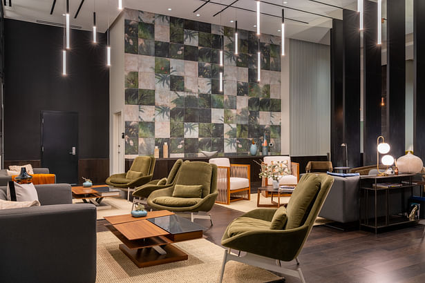Shades of green punctuate the lobby space, realized through unique wallcoverings, fabrics and furniture. (credit: Hunter Kerhart)