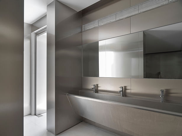 The interior of the public toilets is customised with brushed stainless steel furniture and sanitary fixtures, it creates a visual cooling effect.