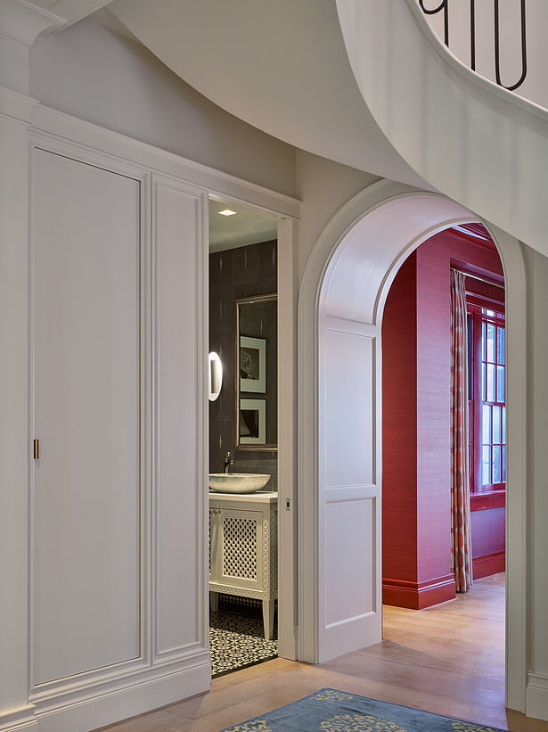 The curved archways allow the colors from adjoining rooms to play off one another.