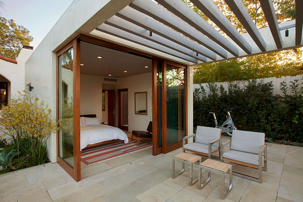 The guest house opens up to a covered terrace.