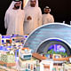 In this Saturday July 5, 2014, photo released by the Dubai Government Media Office, UAE Prime Minister and Dubai ruler Sheik Mohammed bin Rashid Al Maktoum, left, listens to Mohammed Abdullah Al Gergawi, center, chairman of Dubai Holding, during a presentation on the planned Mall of the World project. (CBS News; Photo: AP Photo/Dubai)