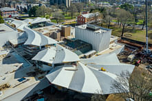 Construction images of the Arkansas Museum of Fine Arts reveal the completion of its pleated concrete roof