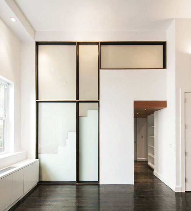 A Simple Yet Artful Composition of Translucent Panels, Baltic Birch, and Black Steel