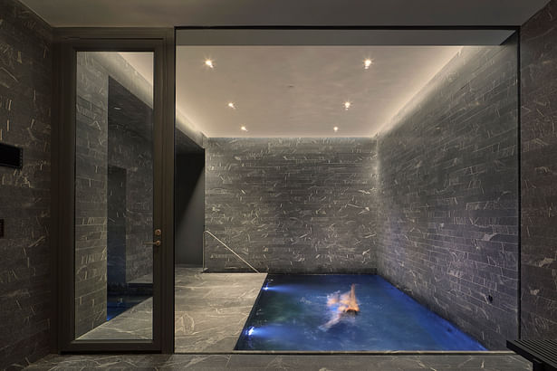 Cellar level spa- pool with endless wave machine and hot tub. Fitness area not photographed.