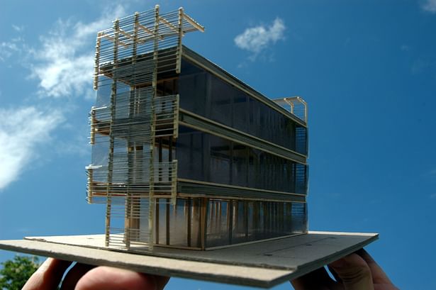 A model of an example of the residential and commercial mixed use buildings on the street front of the project.