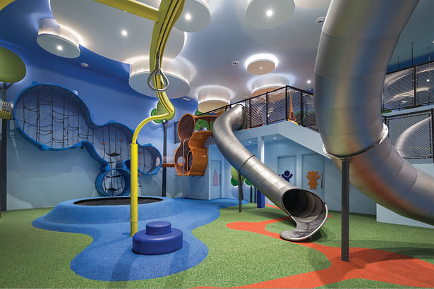 The play area caters to different levels of physicality with age-appropriate play zones and equipment.