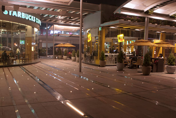 'Pixels' of light in ground between kiosks
