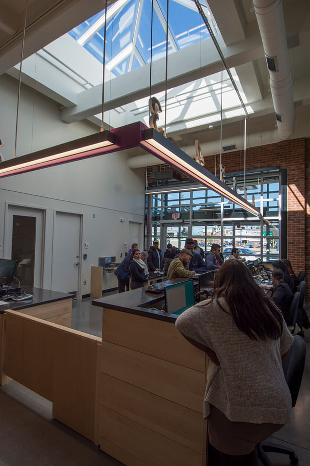 Interior view of signage bar and skylight, looking toward entry