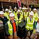 architect Duncan Baker-Brown, waste recycling consultant Kat Fletcher, and other members of the team on the day of the opening of the build. Photo courtesy of Duncan Baker-Brown.