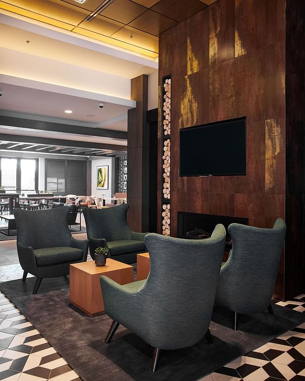 The hotel is designed with comfort and flexibility in mind. Studio HBA designers created both intimate and larger seating areas for making important connections and lasting impressions. (Photo credit: Sean Moore)