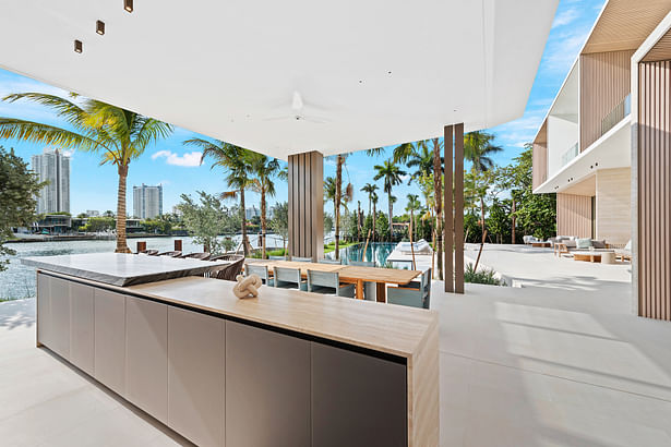 The outdoor kitchen with dining area is ideal for entertaining alfresco.
