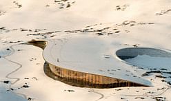 Dorte Mandrup team unveils Nunavut Inuit Heritage Center with rock and turf-covered roof