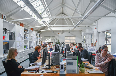 The team working away. Photo by author. 