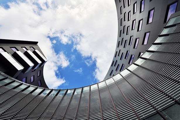 Dynamic view looking upward from central plaza