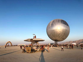 Bjarke Ingels's giant mirrored Orb rises at Burning Man