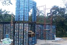 This man is building an entire village from recycled plastic bottles