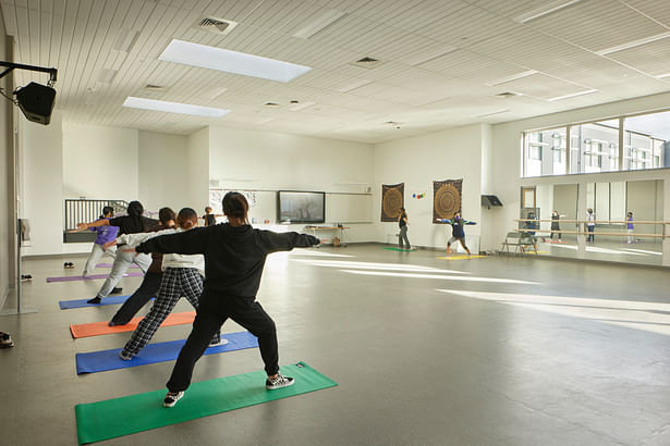 The school features various types of exercise for students to explore, including space for creative movement such as yoga and dance.