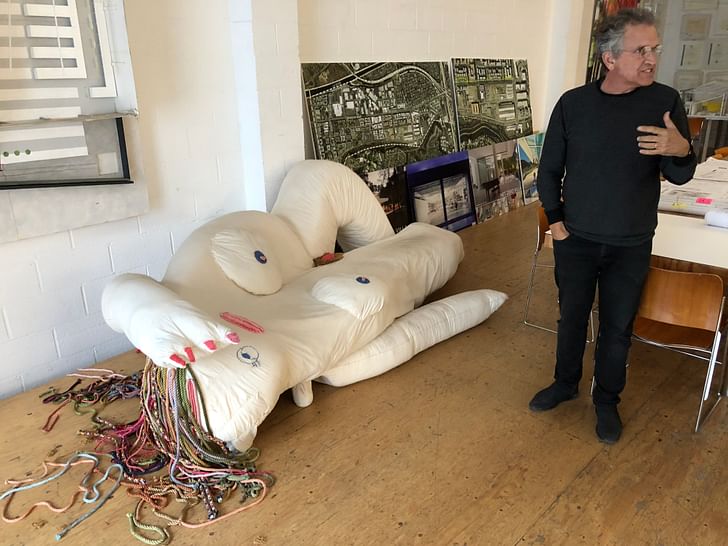 Michael with an art piece produced by one of Lehrer Architects' artists in residence