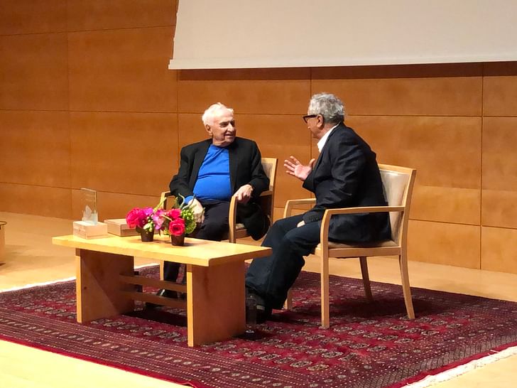 Frank Gehry and Orhan Ayyüce in conversation. Photo by Paul Petrunia