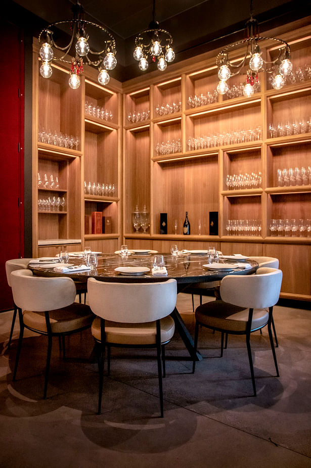 A private dining room can be reserved and closed off for private events. This space features custom artwork and décor that highlight the Chef’s legacy and celebrity status. 