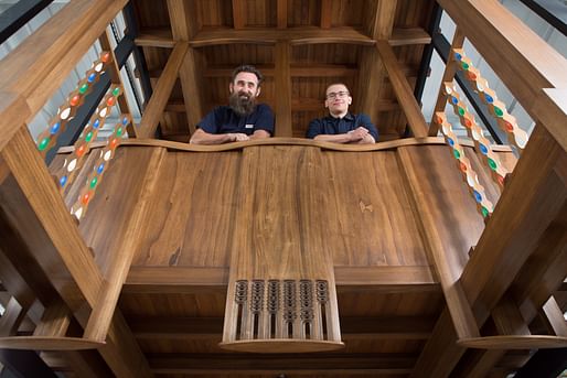 Master craftsmen Angus Johnston and Martins Cirulis of Laurence McIntosh in the Mackintosh Library prototype. Photo © McAteer photo.