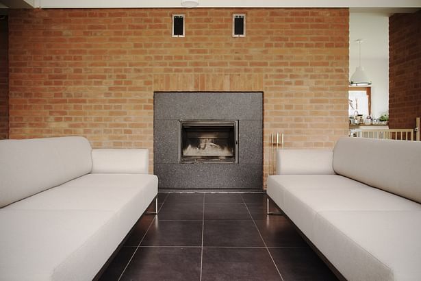 Fireplace in interior brick wall