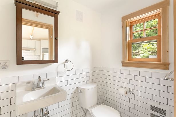 Bathroom, small but bright and functional. Photo by Living Room Realty.