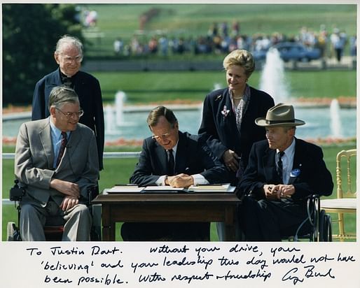 Image courtesy of <a href=https://commons.wikimedia.org/wiki/File:Photo_of_President_George_H._W._Bush_signing_the_Americans_with_Disabilities_Act_inscribed_to_Justin_Dart,_Jr.,_1990.jpg"> National Museum of American History Smithsonian Institution </a>