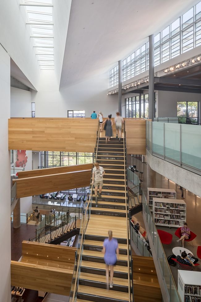 The atrium is accessed via staircases and is overlooked by elevator cores that ensure multiple forms of accessibility for the space. Photo courtesy of Laura Swimmer.jpg