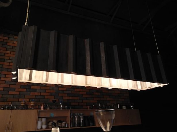 Customized hanging pendant light for Nusantara Coffee Roastery from Artisan Lighting Dubai