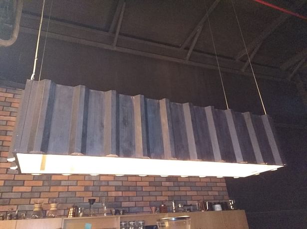 Customized hanging pendant light for Nusantara Coffee Roastery from Artisan Lighting Dubai