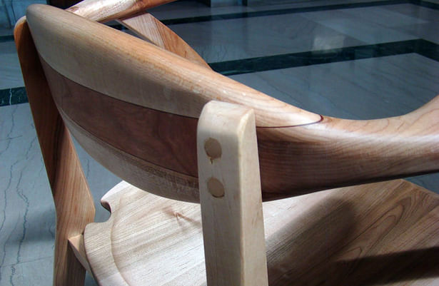 Dowels connecting the back legs to the chair back.
