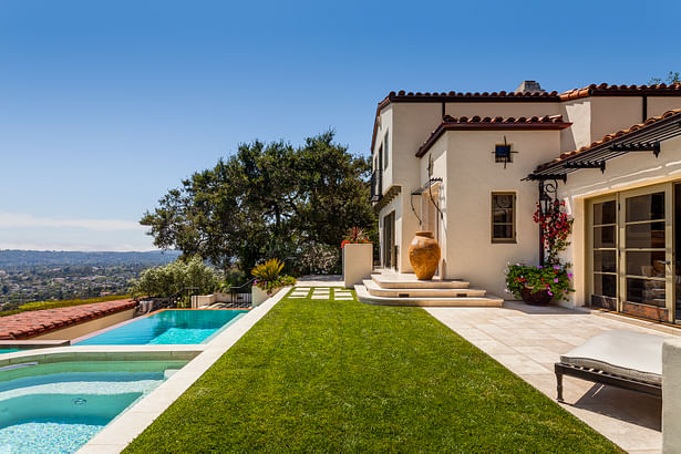 quaint hillside retreat | stunning view property. infinity edge swimming pool design + waterfall fountain. hand crafted iron details | classic santa barbara style. 3388 sf