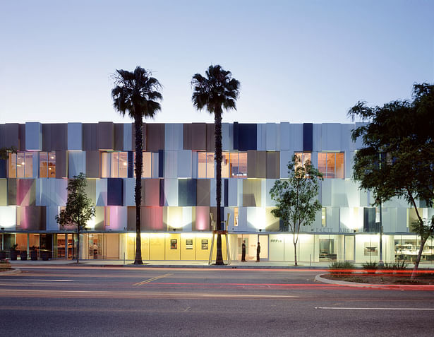 Award-winning façade serves as a rain screen, insulation, and acoustic diffuser for the city’s main artery.