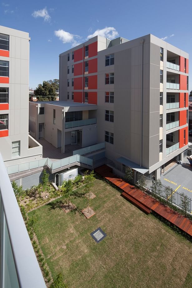 View into courtyard from rear apartments.